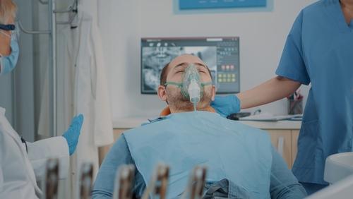 man under nitrous oxide sedation
