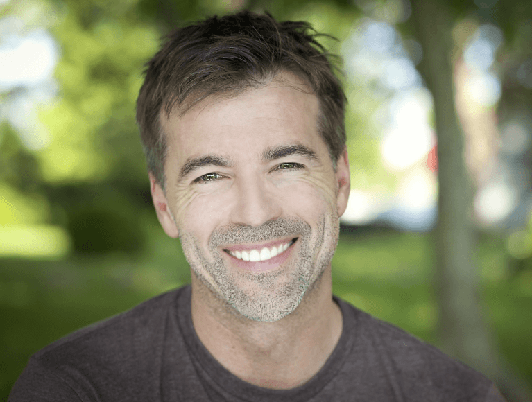 cosmetic dentist surf city | man smiling 