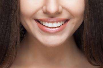 A close photo if a woman with a beautiful smile in Surf City, NC