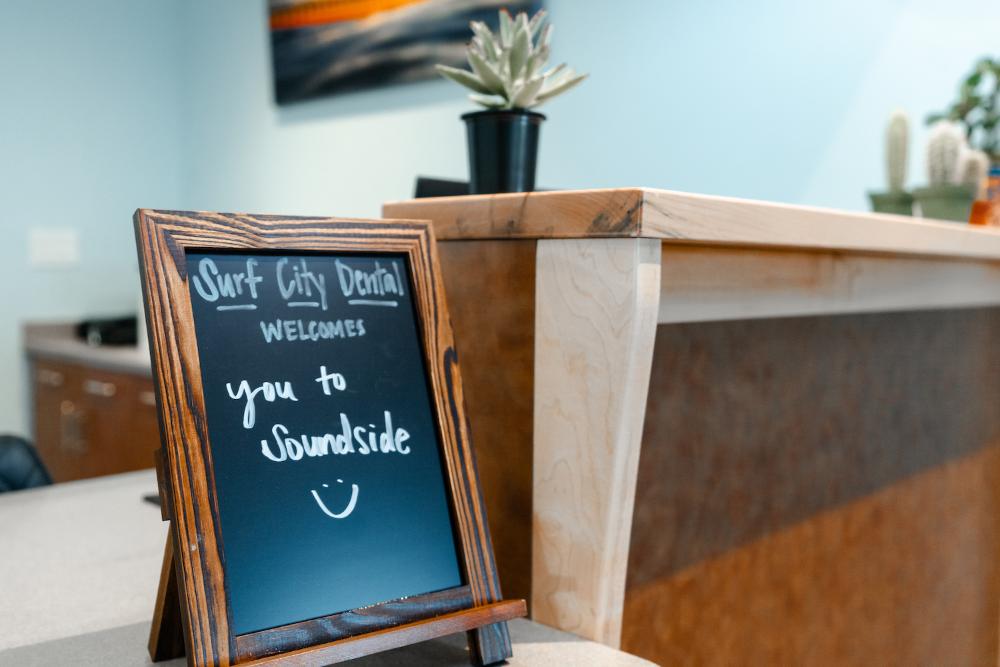 affordable dental care surf city | front desk