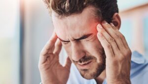 man with headaches and brain fog